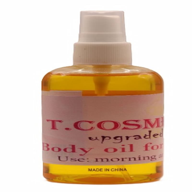 Whitening Body Oil bottle with golden formula for lightening dark spots and evening skin tone